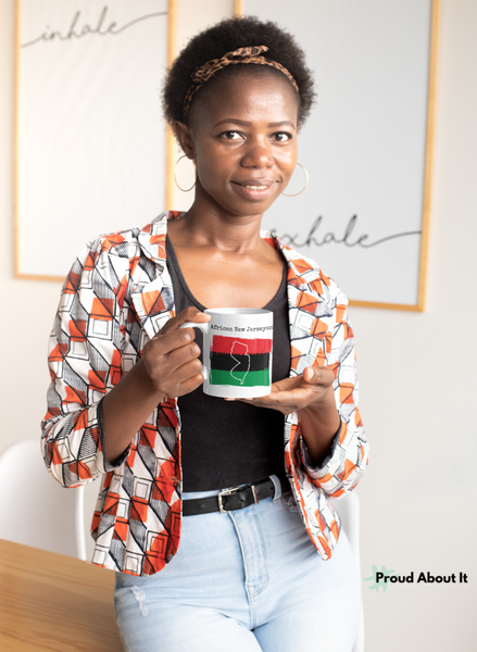 woman holding an African New Jerseyan Ceramic Mug | African Ancestry, New Jersey Pride