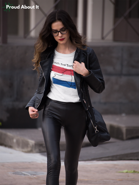 woman wearing a white Dutch New Yorker Unisex T-Shirt – Dutch Heritage, New York Style