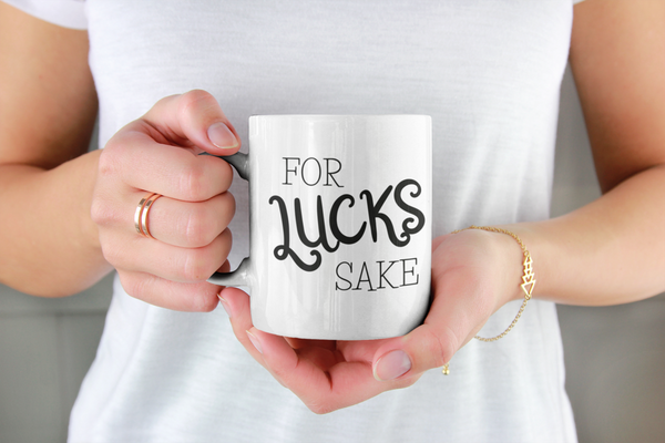 woman holding a For Lucks Sake Ceramic Mug