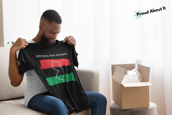 man receiving as a gift a black African New Jerseyan Unisex T-Shirt – African Ancestry, New Jersey Pride