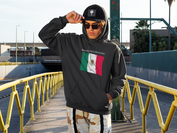 man wearing a black Mexican Californian Unisex Hoodie - Mexican Pride, California Style