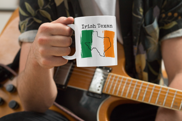 man with guitar holding an Irish Texan Ceramic Mug - Irish Pride, Texas Pride