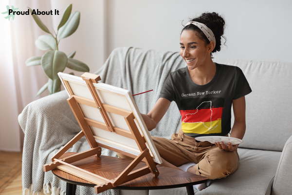 woman painting wearing a dark heather grey German New Yorker Unisex T-Shirt – German Ancestry, New York Style