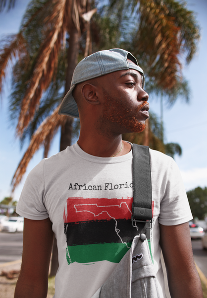 man wearing a white African Floridian Unisex T-Shirt - African Ancestry, Florida Pride
