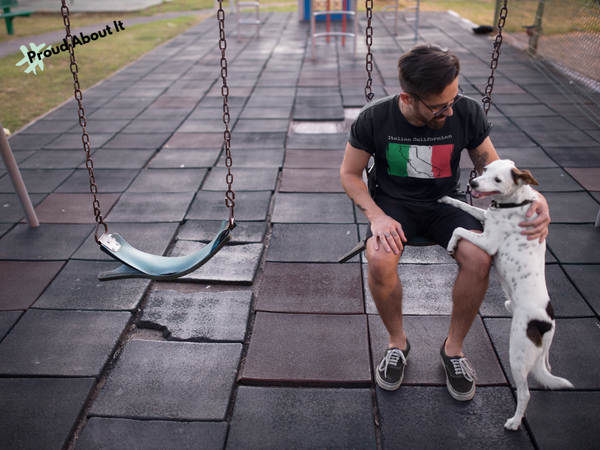 man on swing with his dog wearing a black Italian Californian Unisex T-Shirt – Italian Heritage, California Style